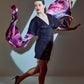 Model showcasing the "Elpída" scarf in a dynamic pose, symbolizing hope and elegance.