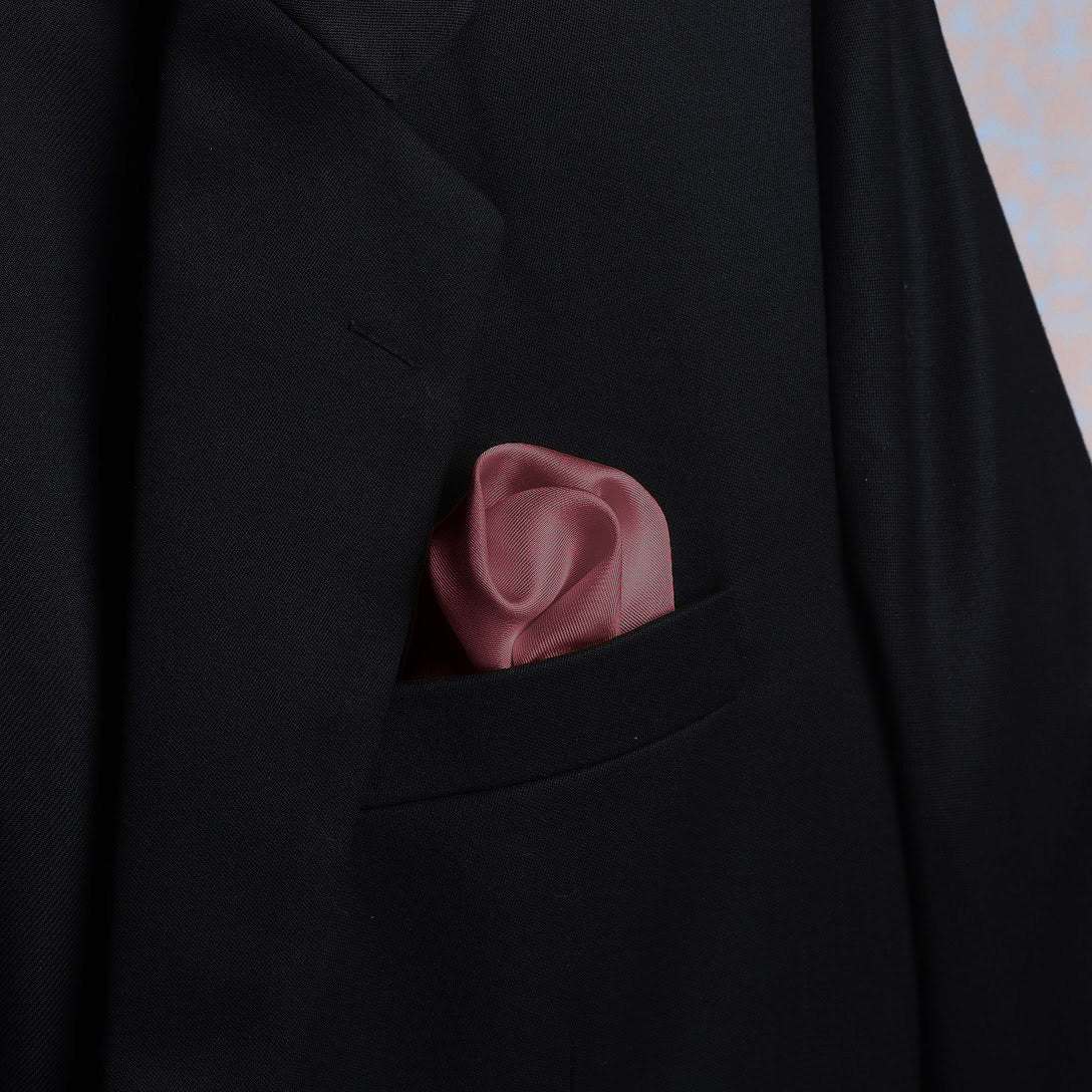 Solid dusty rose scented pocket square in suit pocket - luxury accessory by Freeque