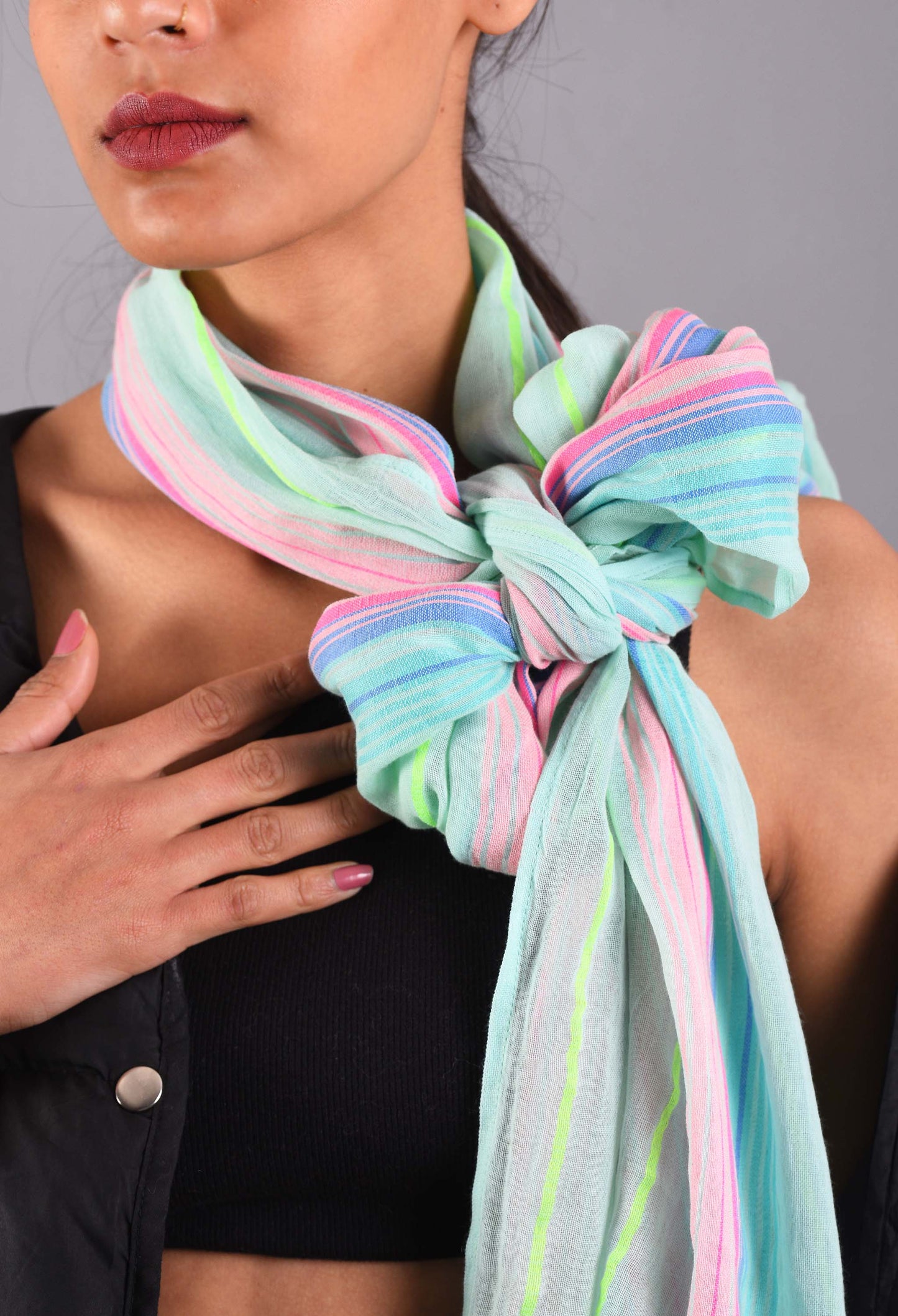 Close-up of Blue Mobster scarf tied in a knot showing pastel stripes