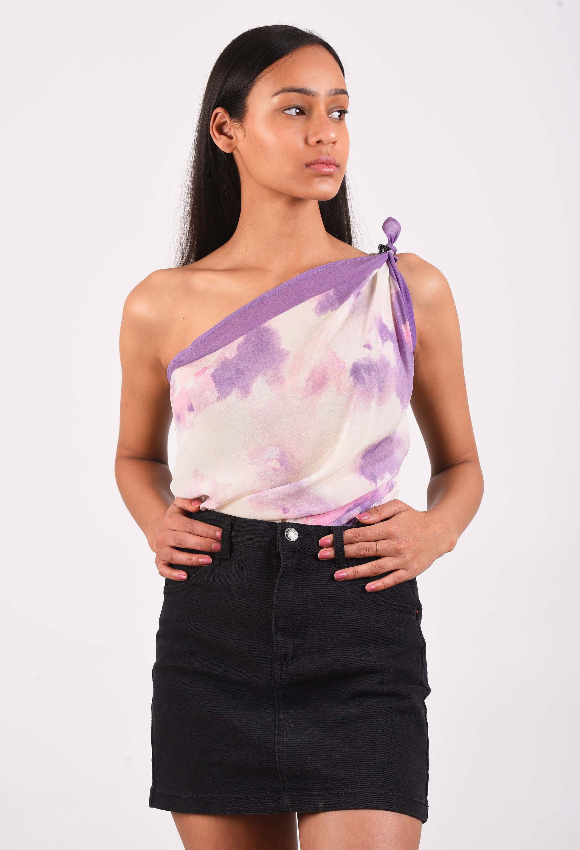 Model styling Lavender Bliss scented scarf as a single-shoulder top