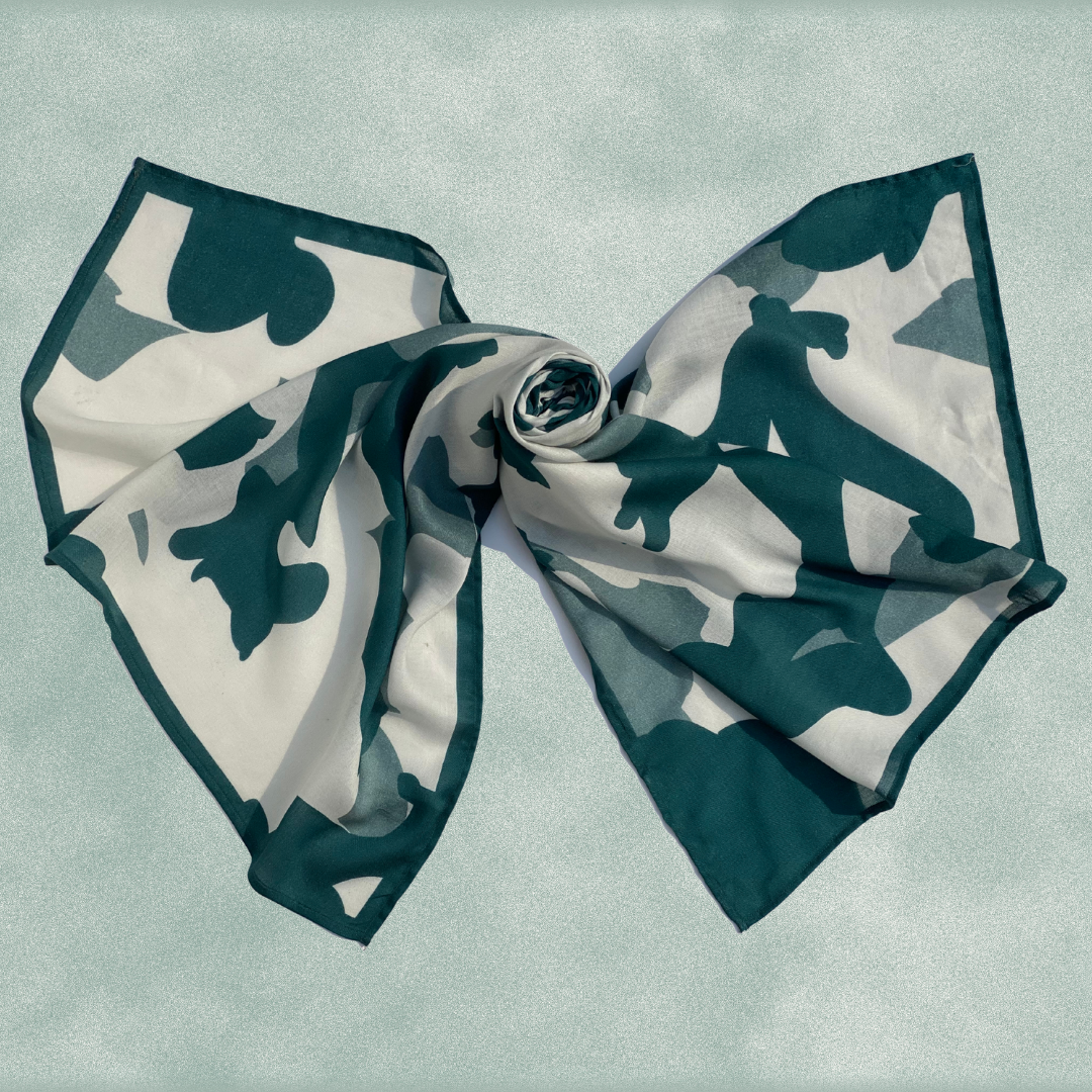 Milky Tide scented stole in twill modal fabric, tied in a bow.